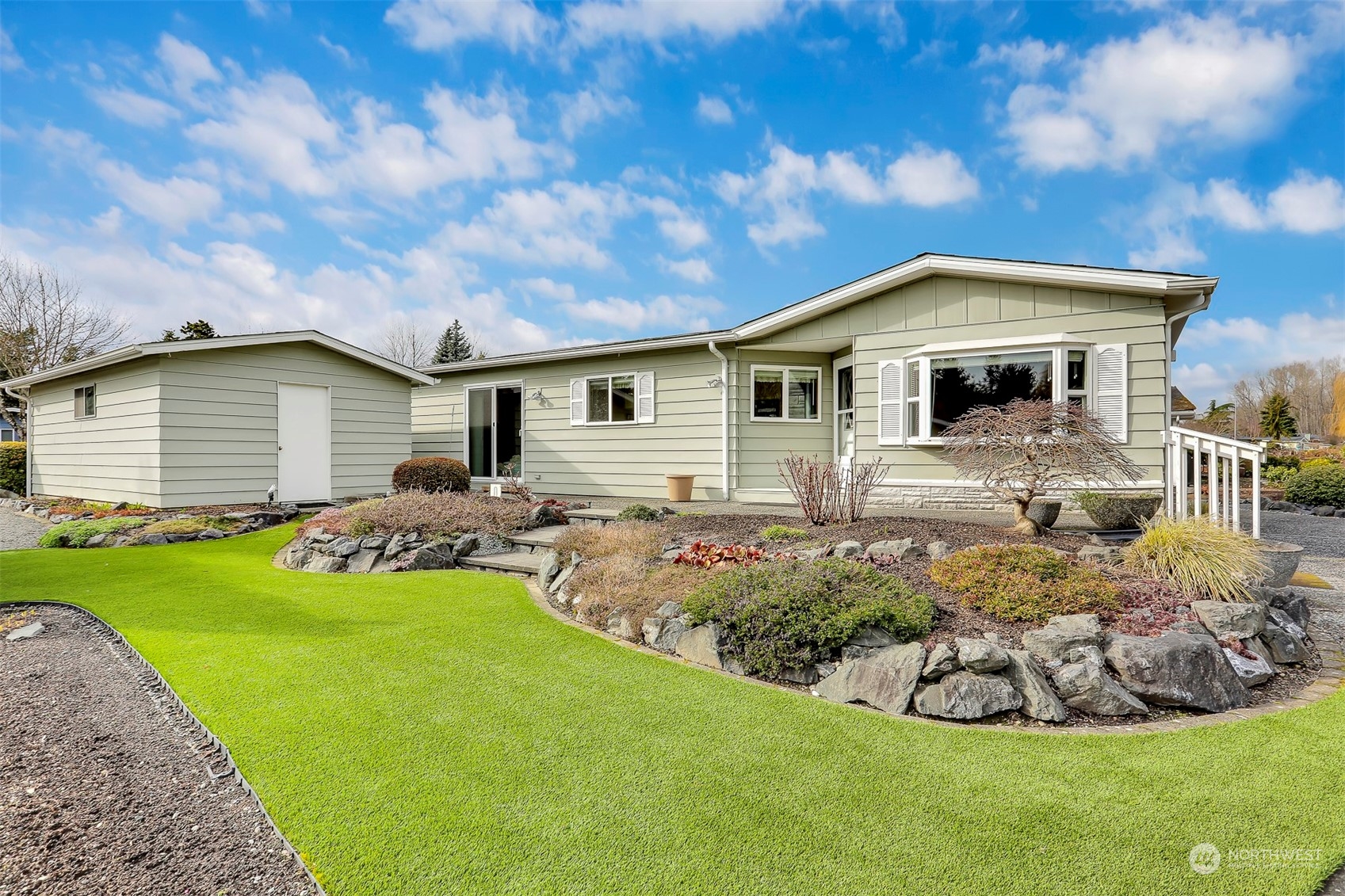 23921 Lake Drive West Bothell, WA 98021 - Photo 1 of 40 a front view of a house with a yard