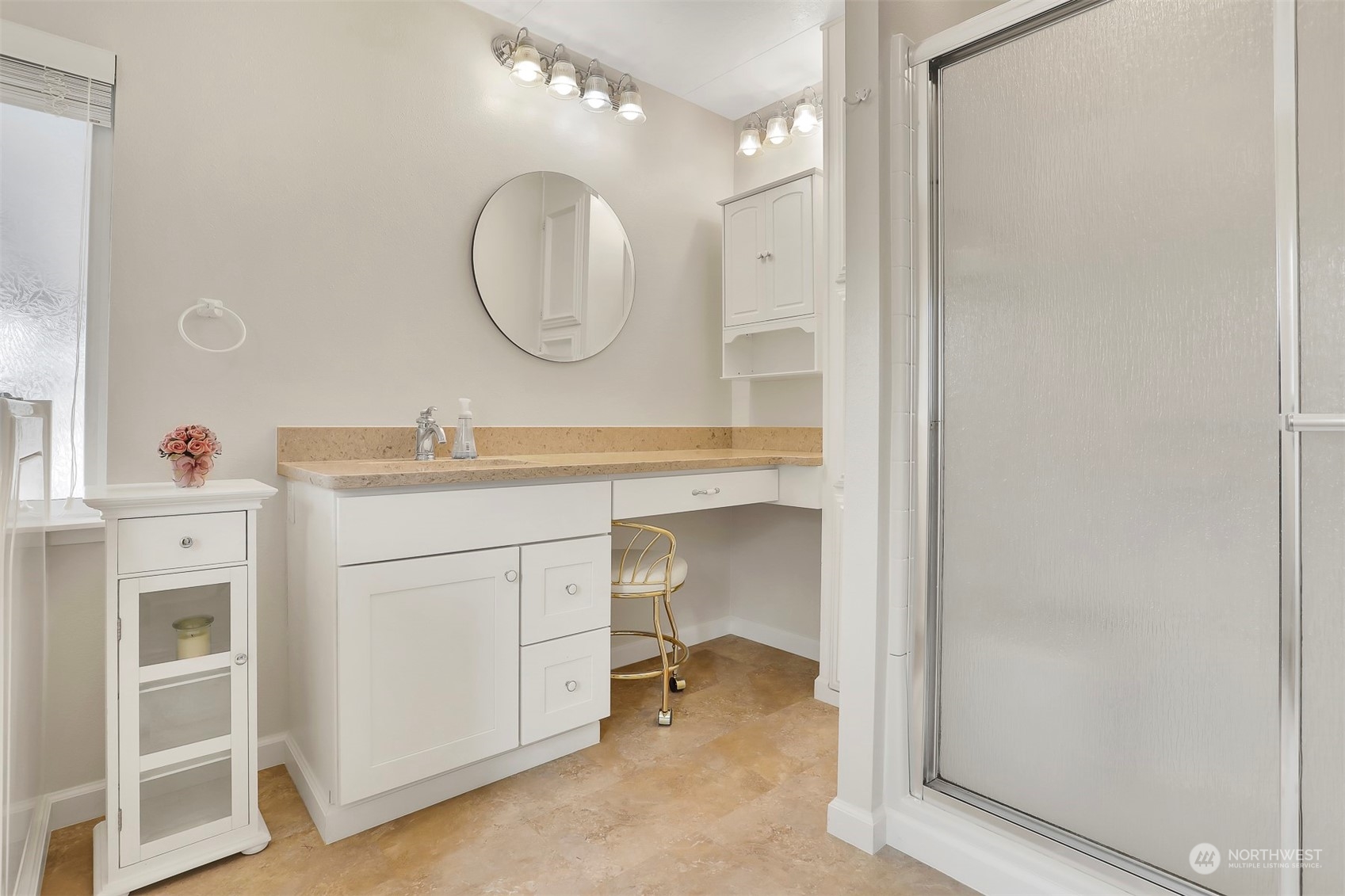 23921 Lake Drive West Bothell, WA 98021 - Photo 23 of 40 a room with a mirror a sink and a mirror