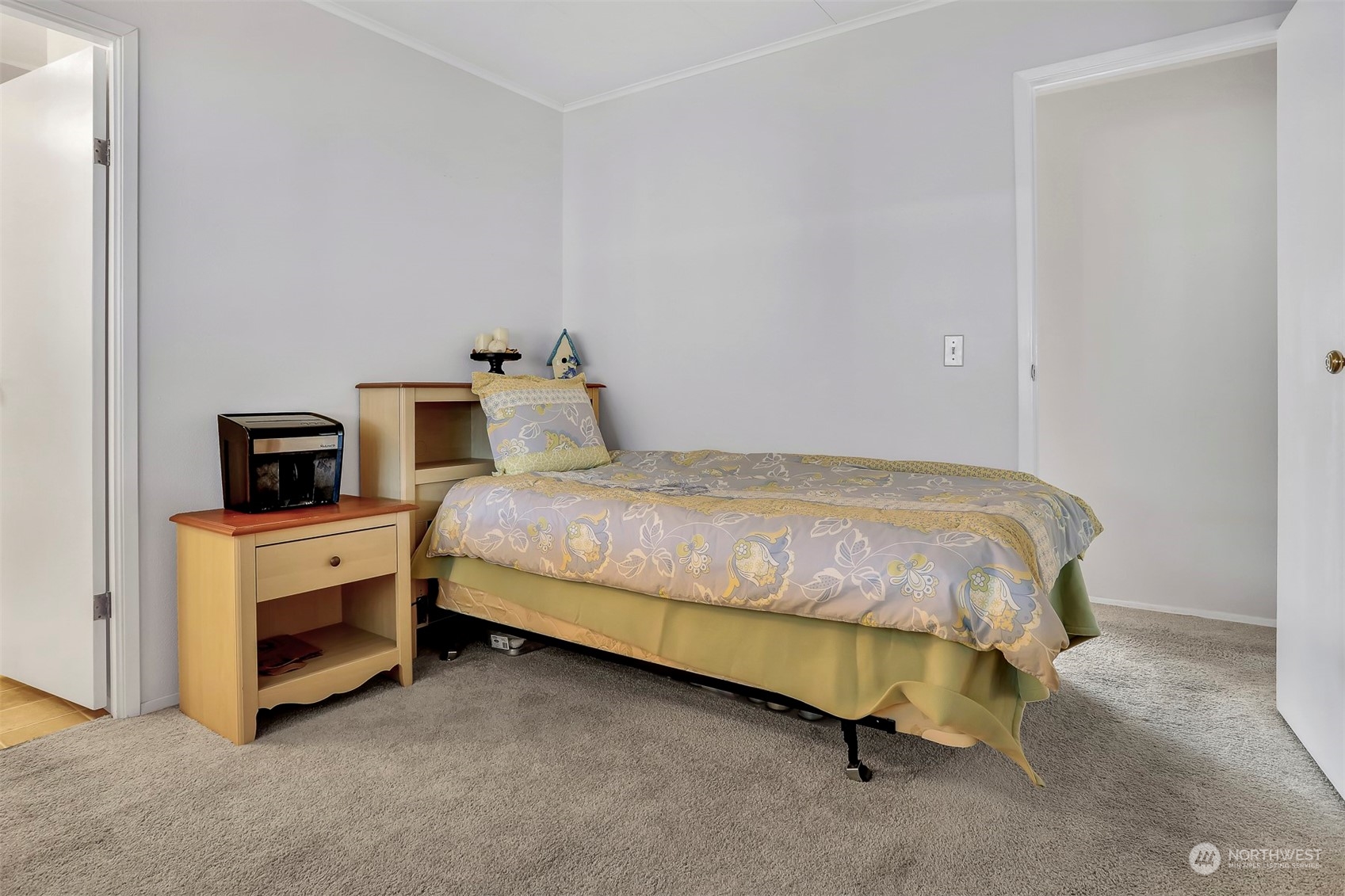 23921 Lake Drive West Bothell, WA 98021 - Photo 25 of 40 a bedroom with a bed and a tv