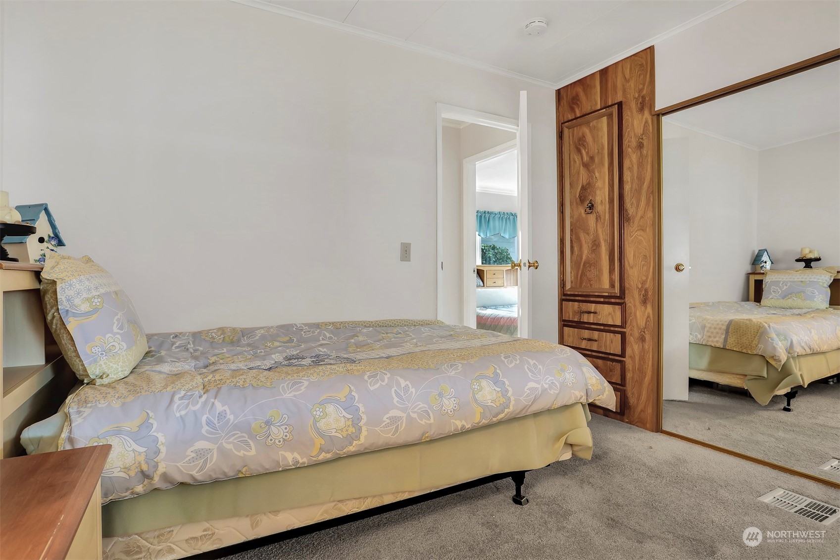 23921 Lake Drive West Bothell, WA 98021 - Photo 26 of 40 a bedroom with a bed and a window