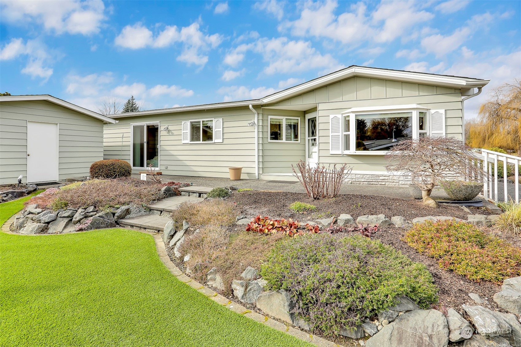 23921 Lake Drive West Bothell, WA 98021 - Photo 29 of 40 a front view of a house with garden