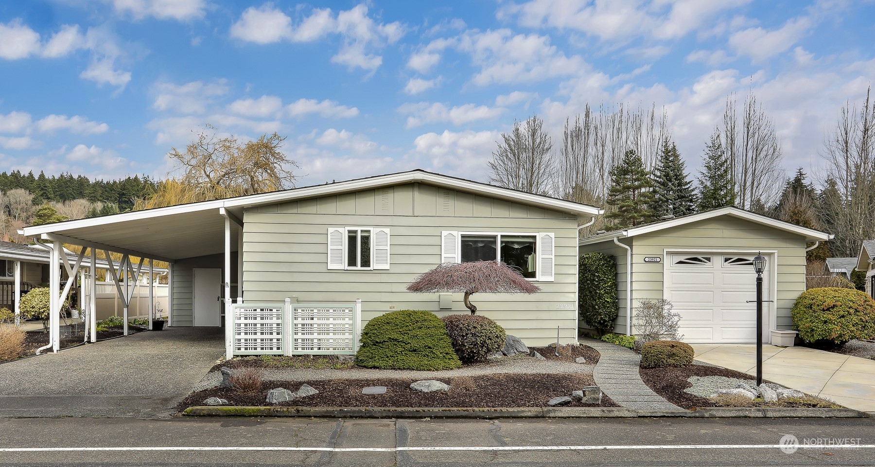 23921 Lake Drive West Bothell, WA 98021 - Photo 32 of 40 a view of a house with a patio