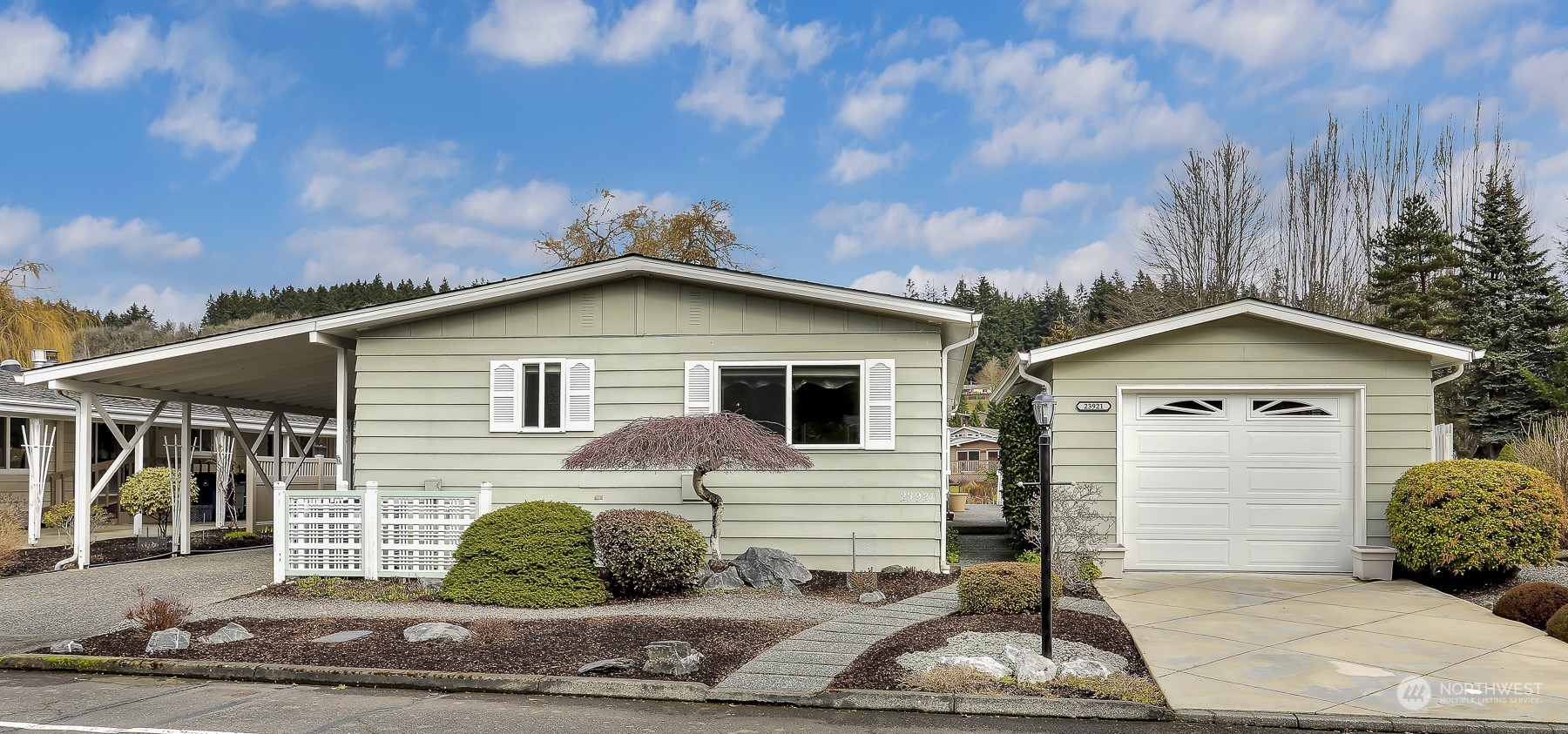 23921 Lake Drive West Bothell, WA 98021 - Photo 34 of 40 a view of a house with a yard