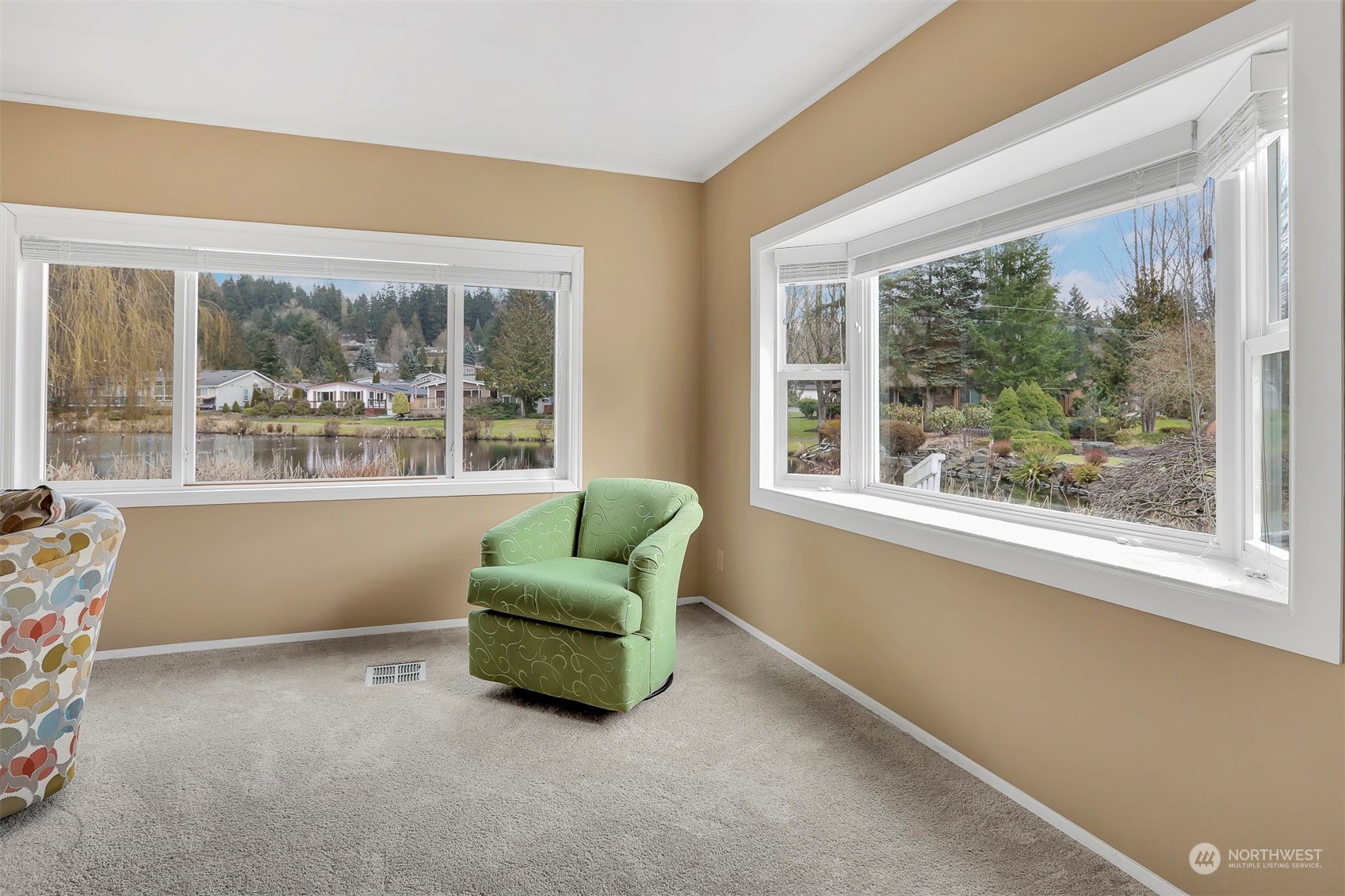 23921 Lake Drive West Bothell, WA 98021 - Photo 7 of 40 a living room with furniture and a large window
