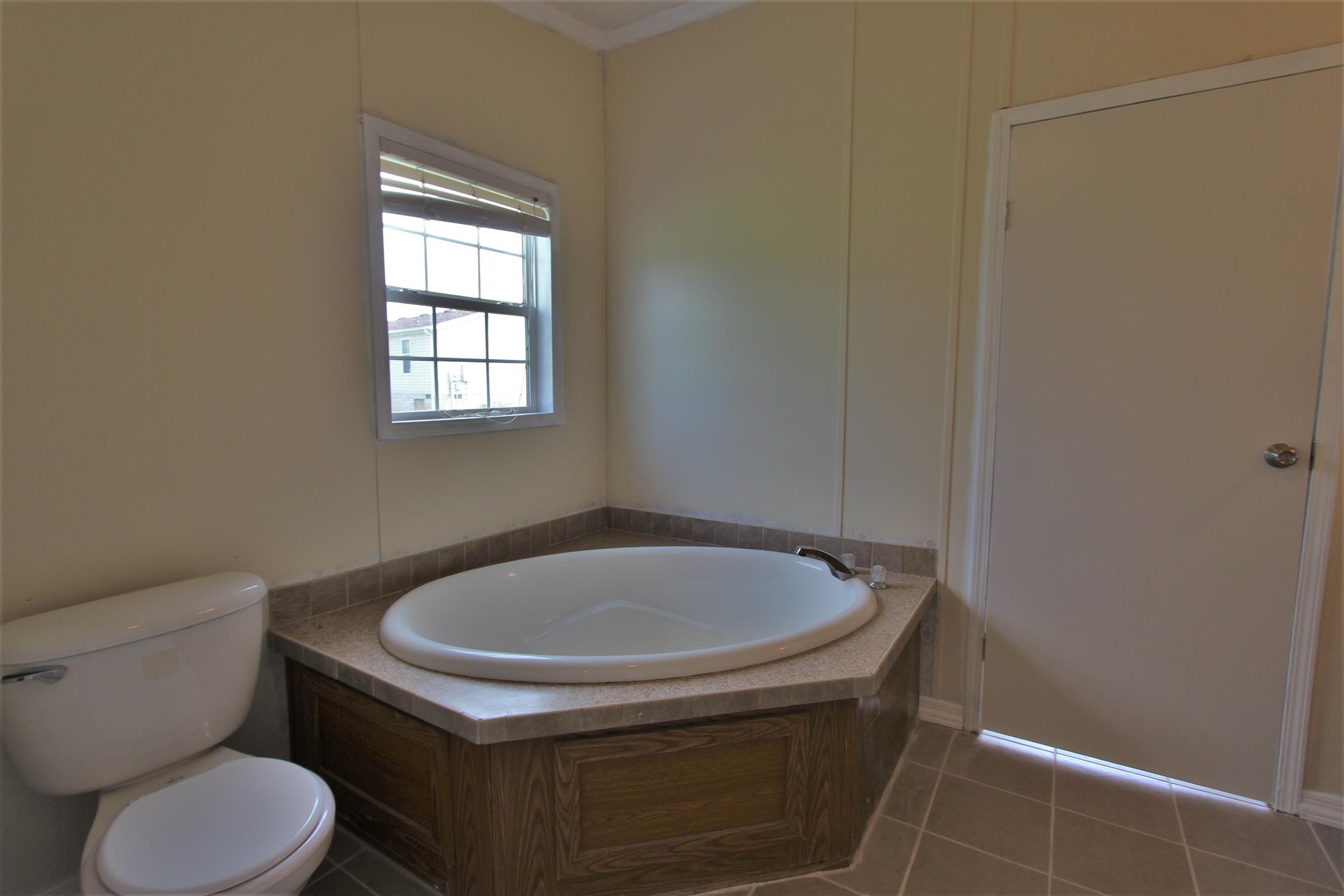 4430 Beasleys Bend Road Lebanon, TN 37087 - Photo 12 of 16 a bathroom with a sink and a toilet