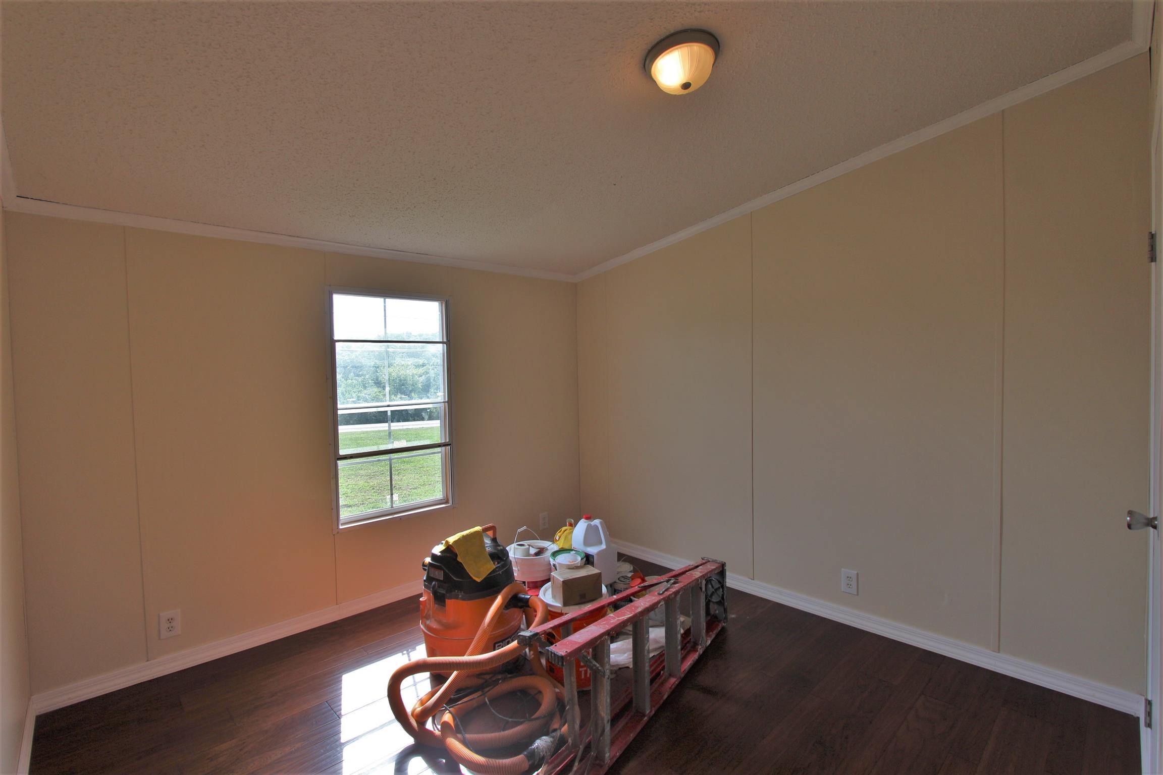 4430 Beasleys Bend Road Lebanon, TN 37087 - Photo 13 of 16 a room with wooden floor and a window