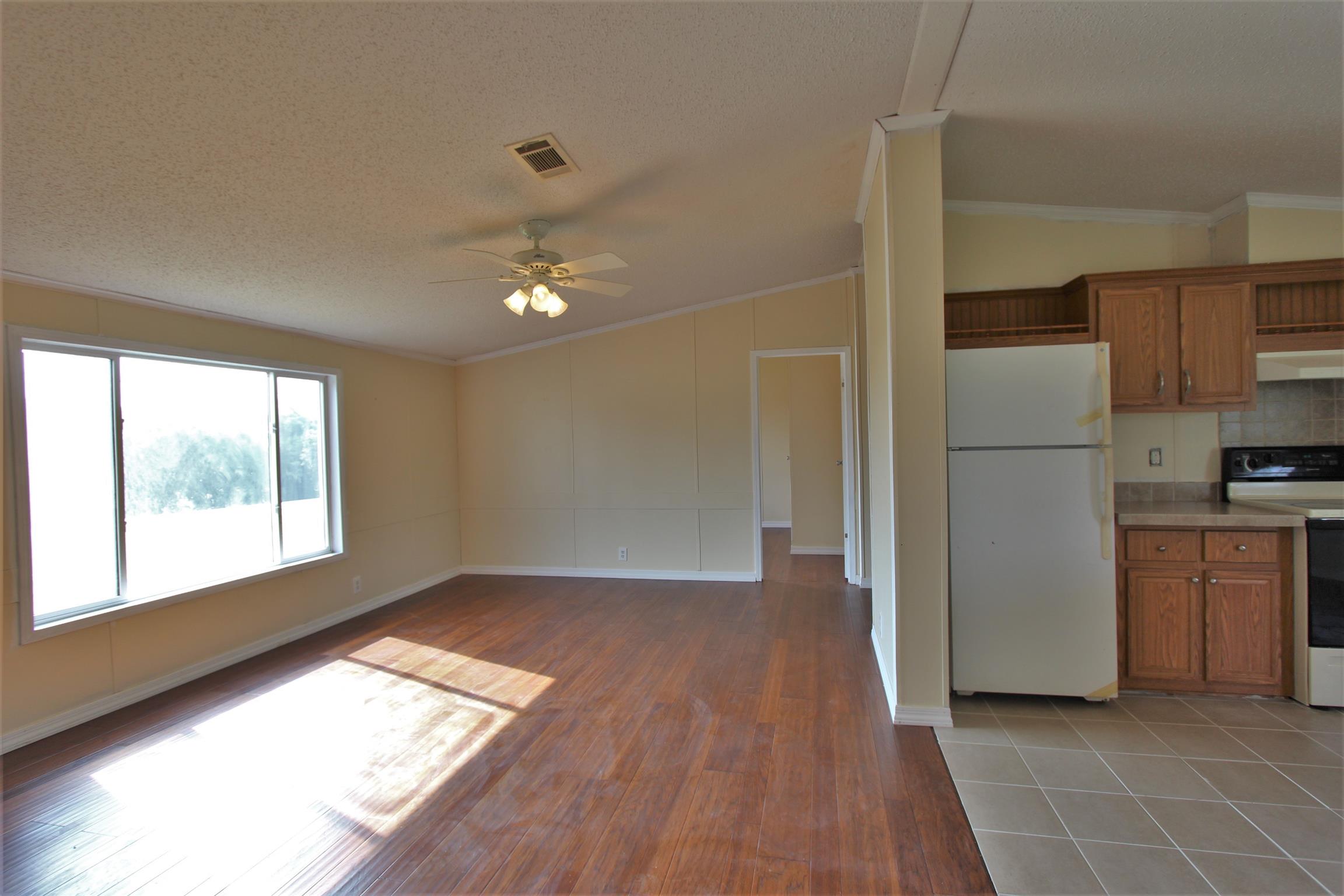 4430 Beasleys Bend Road Lebanon, TN 37087 - Photo 9 of 16 a kitchen with a refrigerator and a stove top oven