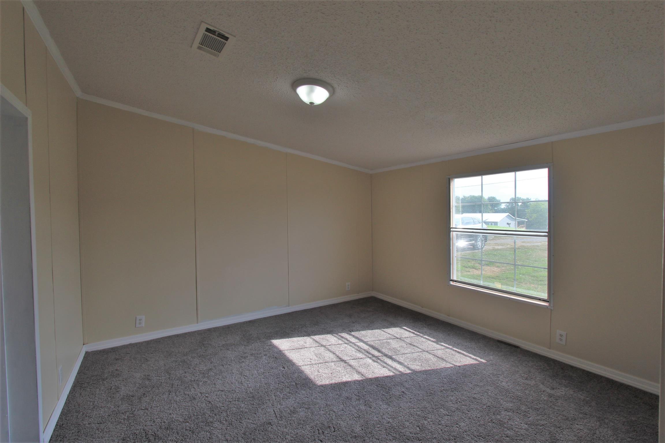 4430 Beasleys Bend Road Lebanon, TN 37087 - Photo 10 of 16 an empty room with windows