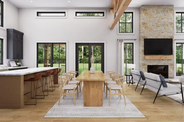 a living room with fireplace furniture and a flat screen tv
