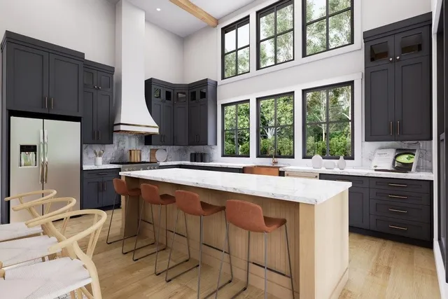 a kitchen with a sink window and cabinets