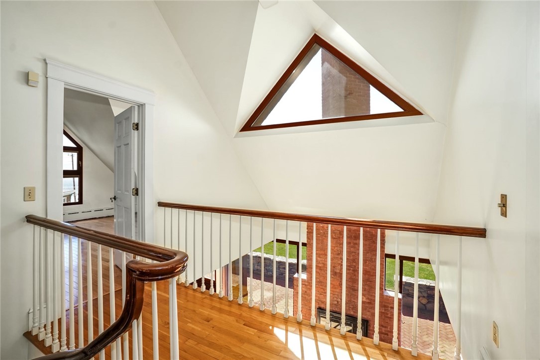 10 Emerson Road Jamestown, RI 02835 - Photo 19 of 31 Second level landing overlooks the Living Room.