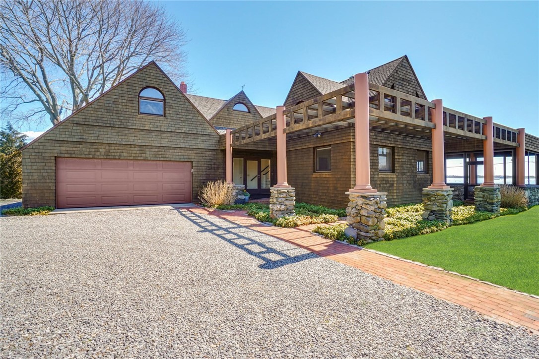 10 Emerson Road Jamestown, RI 02835 - Photo 4 of 31 Oversized two car Garage with finished, heated space above!