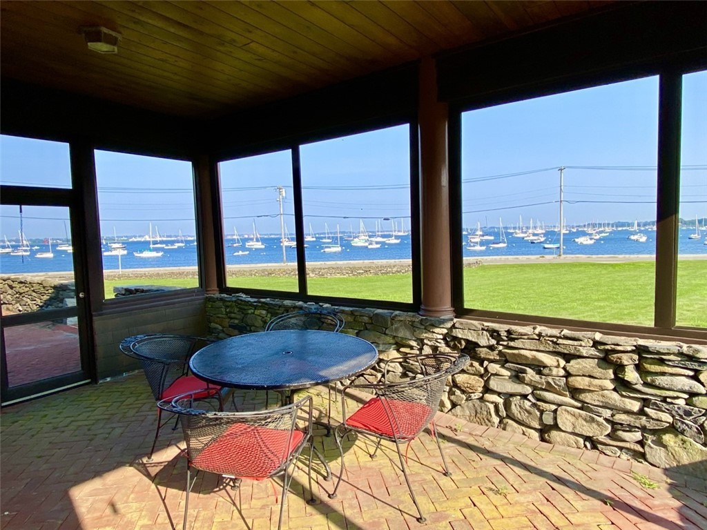 10 Emerson Road Jamestown, RI 02835 - Photo 9 of 31 This screened in porch is 22' x 12', who would ever want to leave?