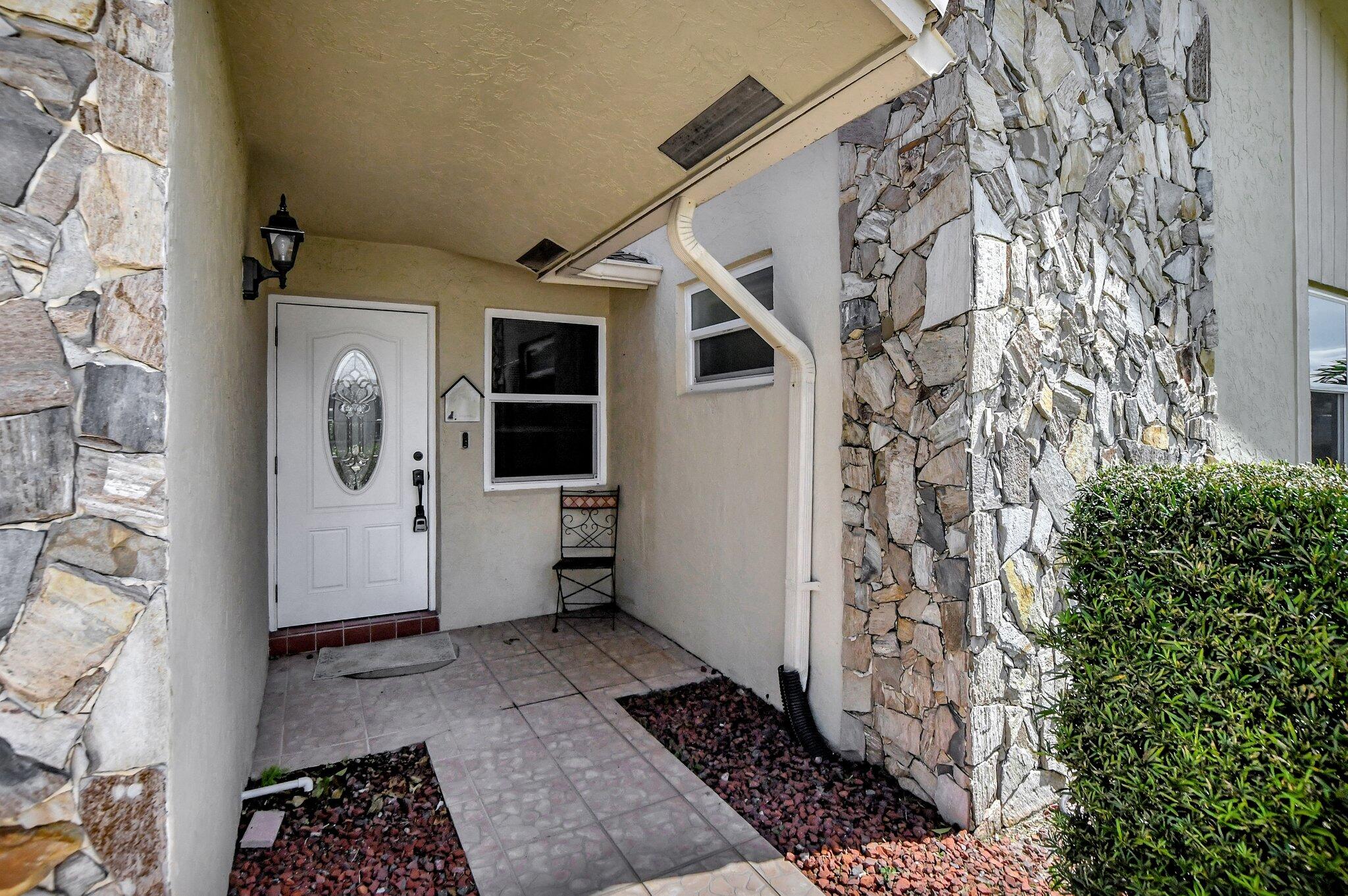 22930 Southwest 56th Avenue Boca Raton, FL 33433 - Photo 2 of 34 FRONT