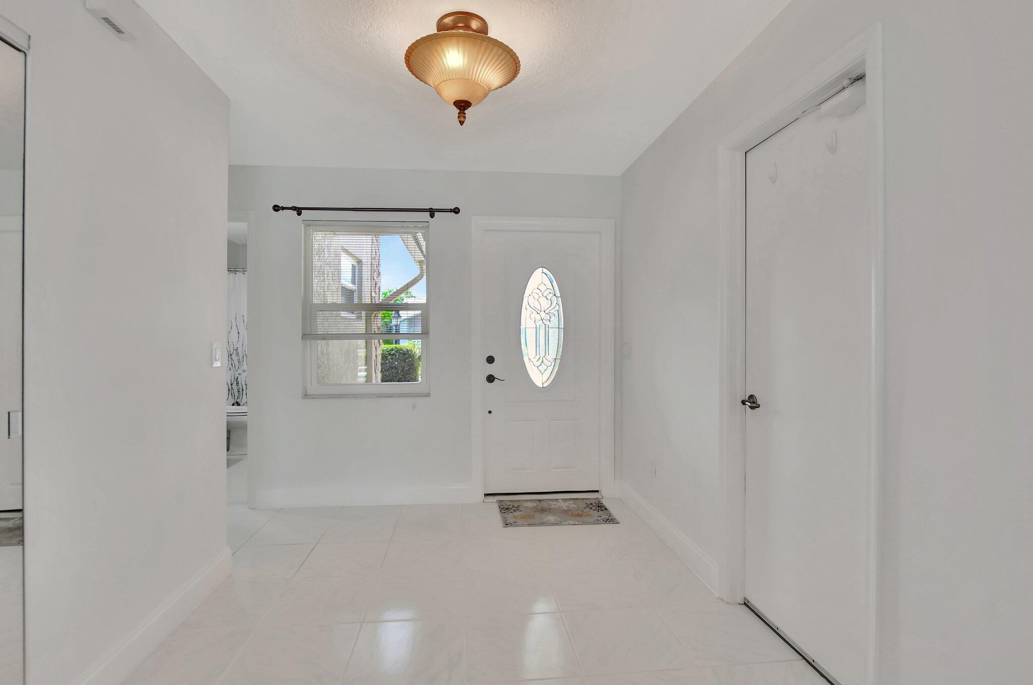22930 Southwest 56th Avenue Boca Raton, FL 33433 - Photo 3 of 34 FOYER