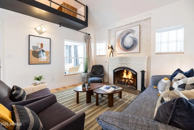 a bedroom with bed and a window