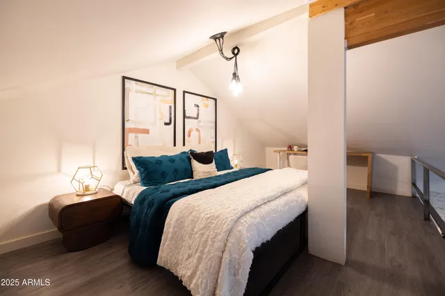 a kitchen with granite countertop a stove and refrigerator