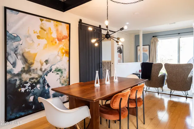 a bedroom with a bed and a night stand