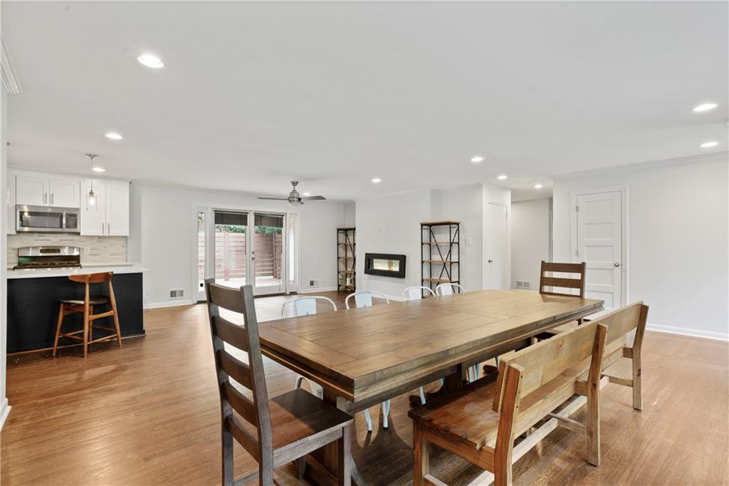 3363 Briarcliff Road Northeast Atlanta, GA 30345 - Photo 11 of 44 a view of a dining room with furniture and wooden floor