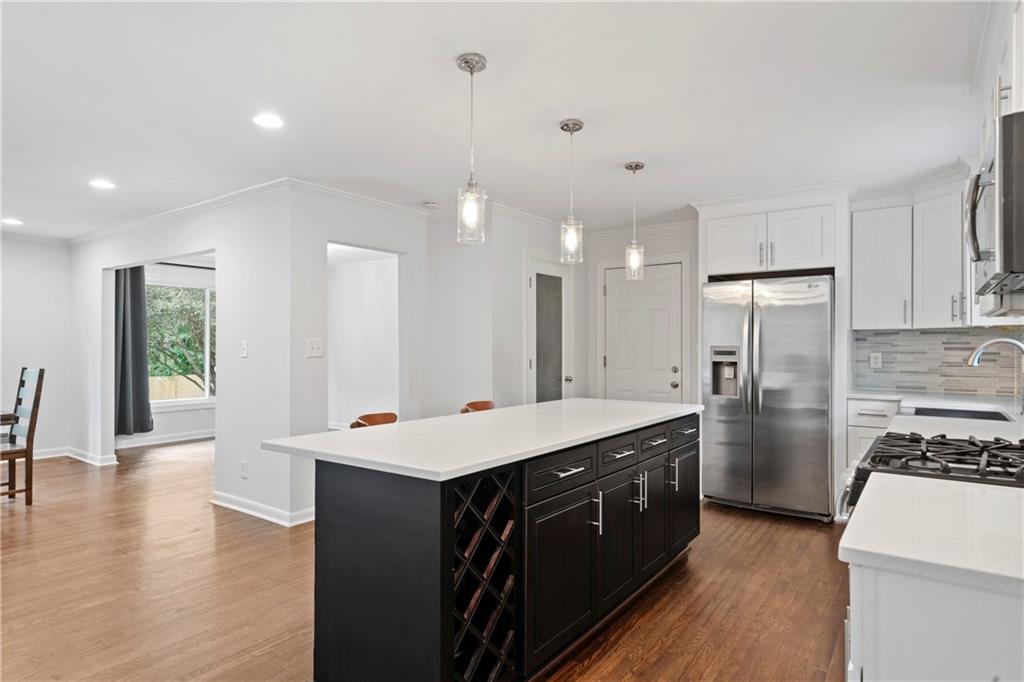 3363 Briarcliff Road Northeast Atlanta, GA 30345 - Photo 16 of 44 a kitchen with a sink a stove a refrigerator and a oven