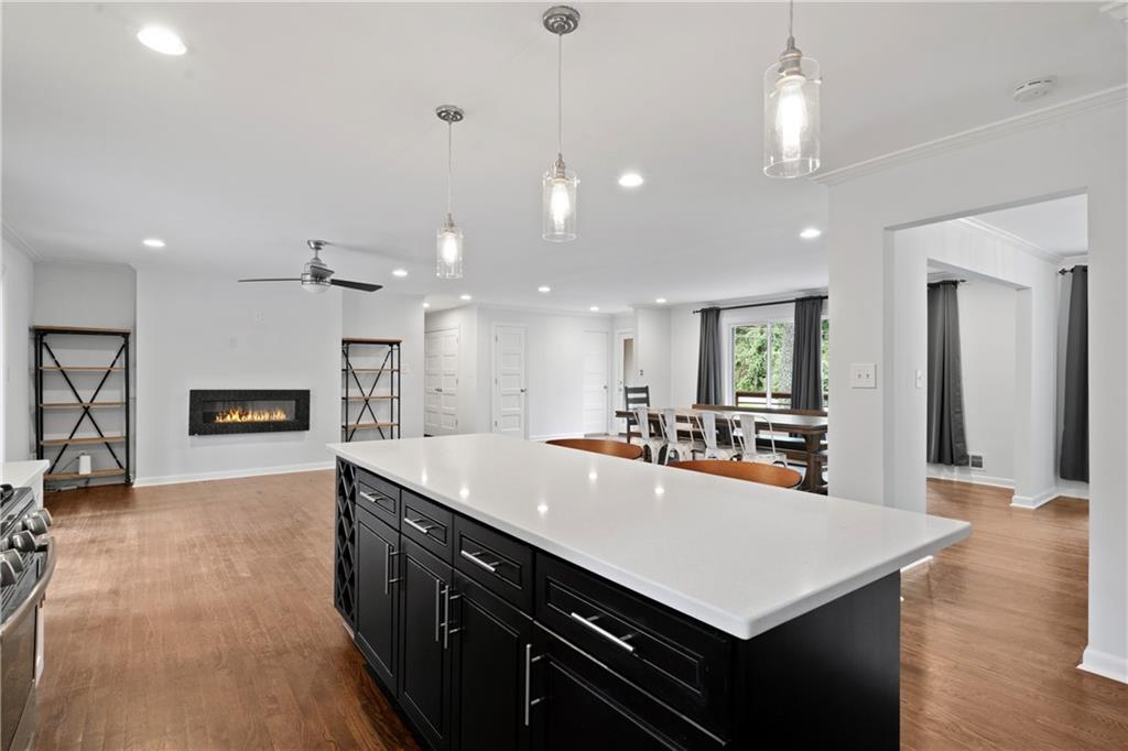 3363 Briarcliff Road Northeast Atlanta, GA 30345 - Photo 17 of 44 a large kitchen with kitchen island a sink appliances and a counter top space