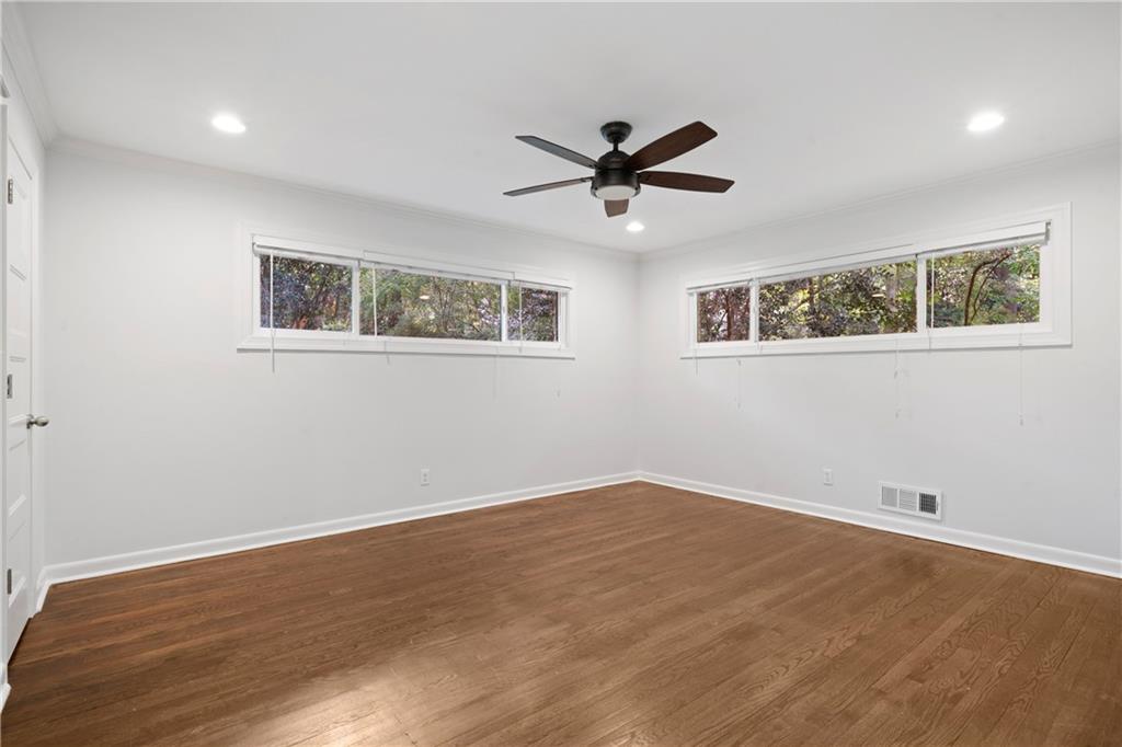 3363 Briarcliff Road Northeast Atlanta, GA 30345 - Photo 23 of 44 a view of a big room with wooden floor and windows