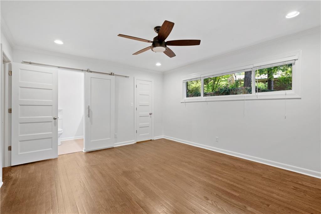 3363 Briarcliff Road Northeast Atlanta, GA 30345 - Photo 24 of 44 wooden floor in an empty room with a window