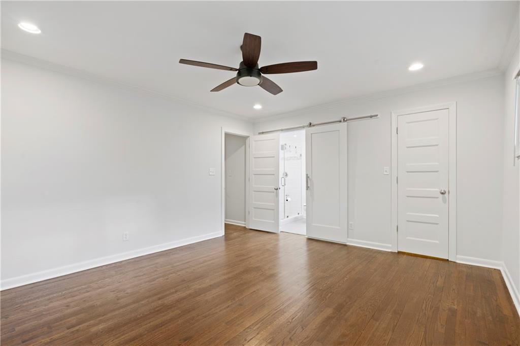 3363 Briarcliff Road Northeast Atlanta, GA 30345 - Photo 25 of 44 a view of an empty room and wooden floor