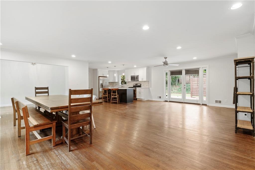 3363 Briarcliff Road Northeast Atlanta, GA 30345 - Photo 7 of 44 a view of a dining room with furniture and wooden floor