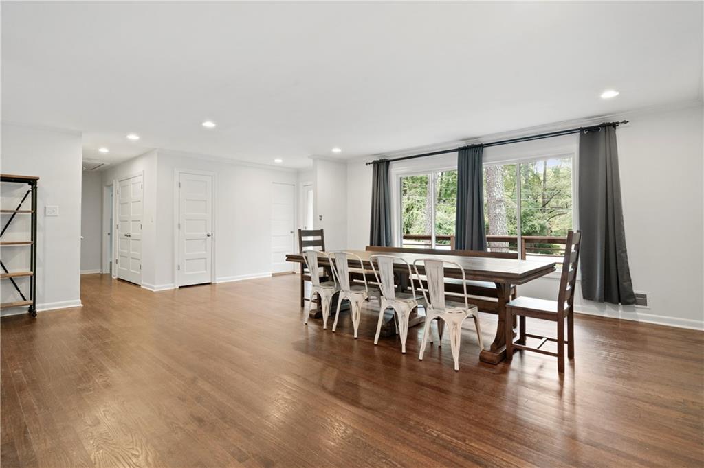 3363 Briarcliff Road Northeast Atlanta, GA 30345 - Photo 10 of 44 a view of a dining room with furniture window and wooden floor