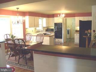 6775 Phillips Mill Road New Hope, PA 18938 - Photo 3 of 6 a kitchen with a table and chairs