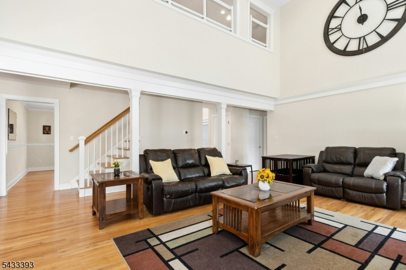 33 Stanton Street Clark, NJ 07066 - Photo 6 of 37 a living room with furniture and a table