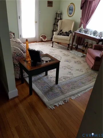a room with furniture and a rug