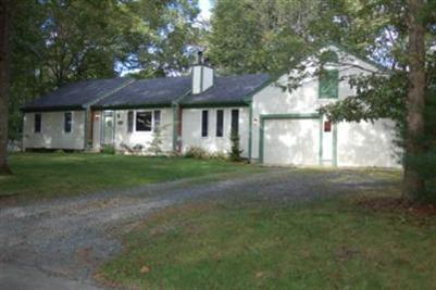 28 Deer Ridge Road Mashpee, MA 02649 - Photo 11 of 13 a front view of a house with garden