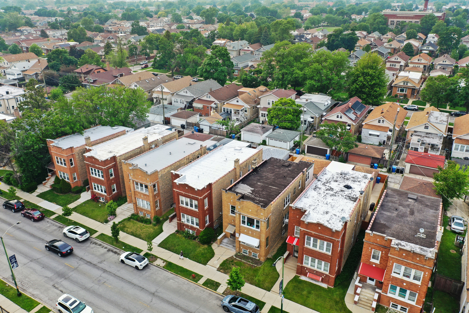 6024 West Addison Street Chicago, IL 60634 - Photo 6 of 11 an aerial view of residential houses with outdoor space
