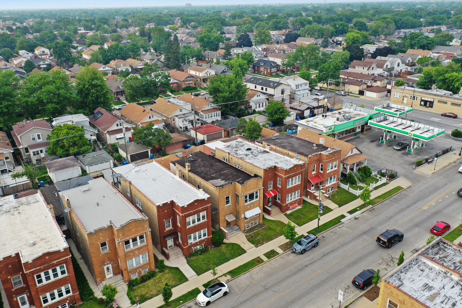 6024 West Addison Street Chicago, IL 60634 - Photo 7 of 11 an aerial view of a city with lots of residential buildings