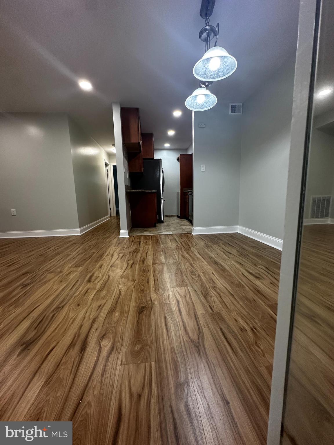 1130 South Washington Street, Unit T2 Falls Church, VA 22046 - Photo 21 of 24 a view of a livingroom with a kitchen