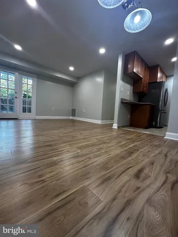 a view of a kitchen with a sink