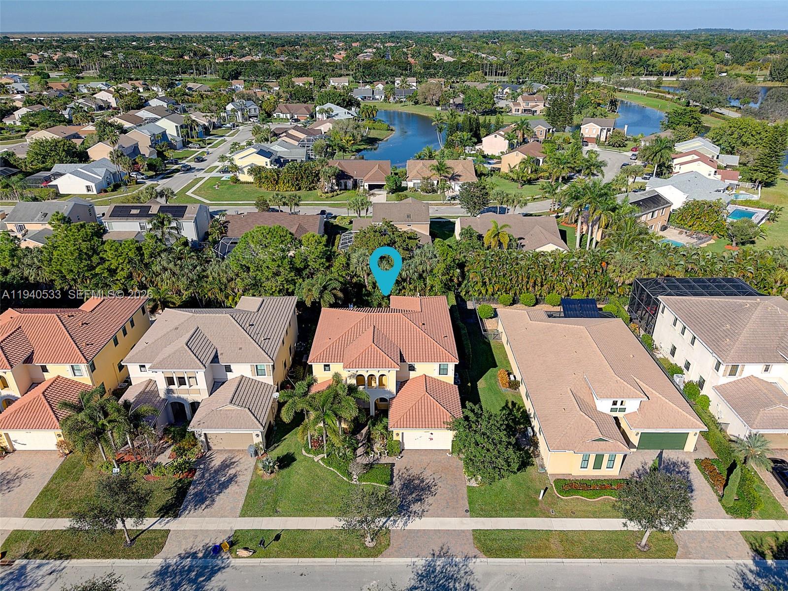 12097 Boca Reserve Lane Boca Raton, FL 33428 - Photo 52 of 54 an aerial view of residential houses with outdoor space and street view
