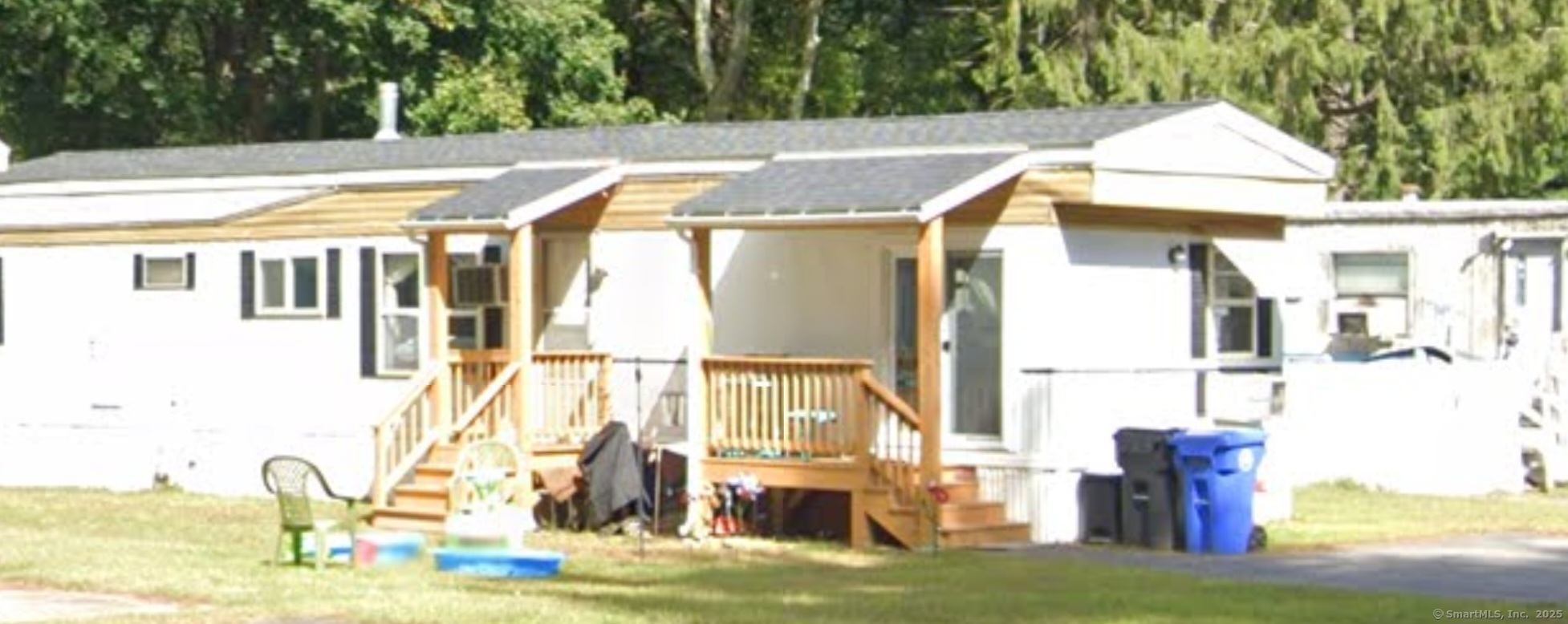 14 R And R Park Killingly, CT 06239 - Photo 1 of 1 a view of building with yard