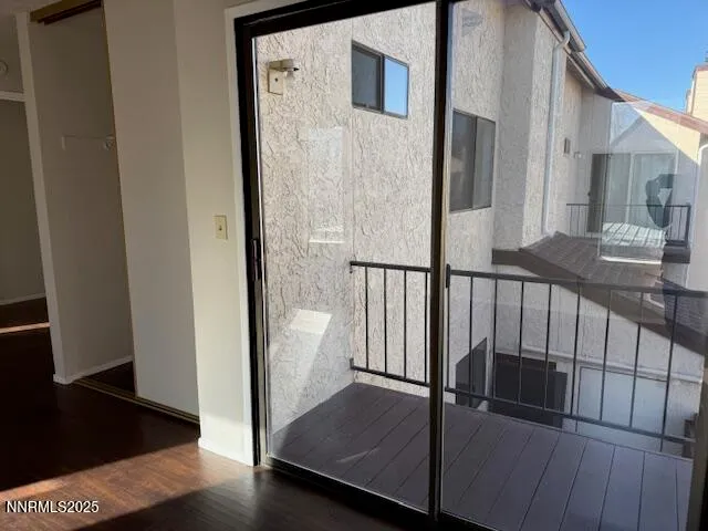 a view of a hallway with a dining room