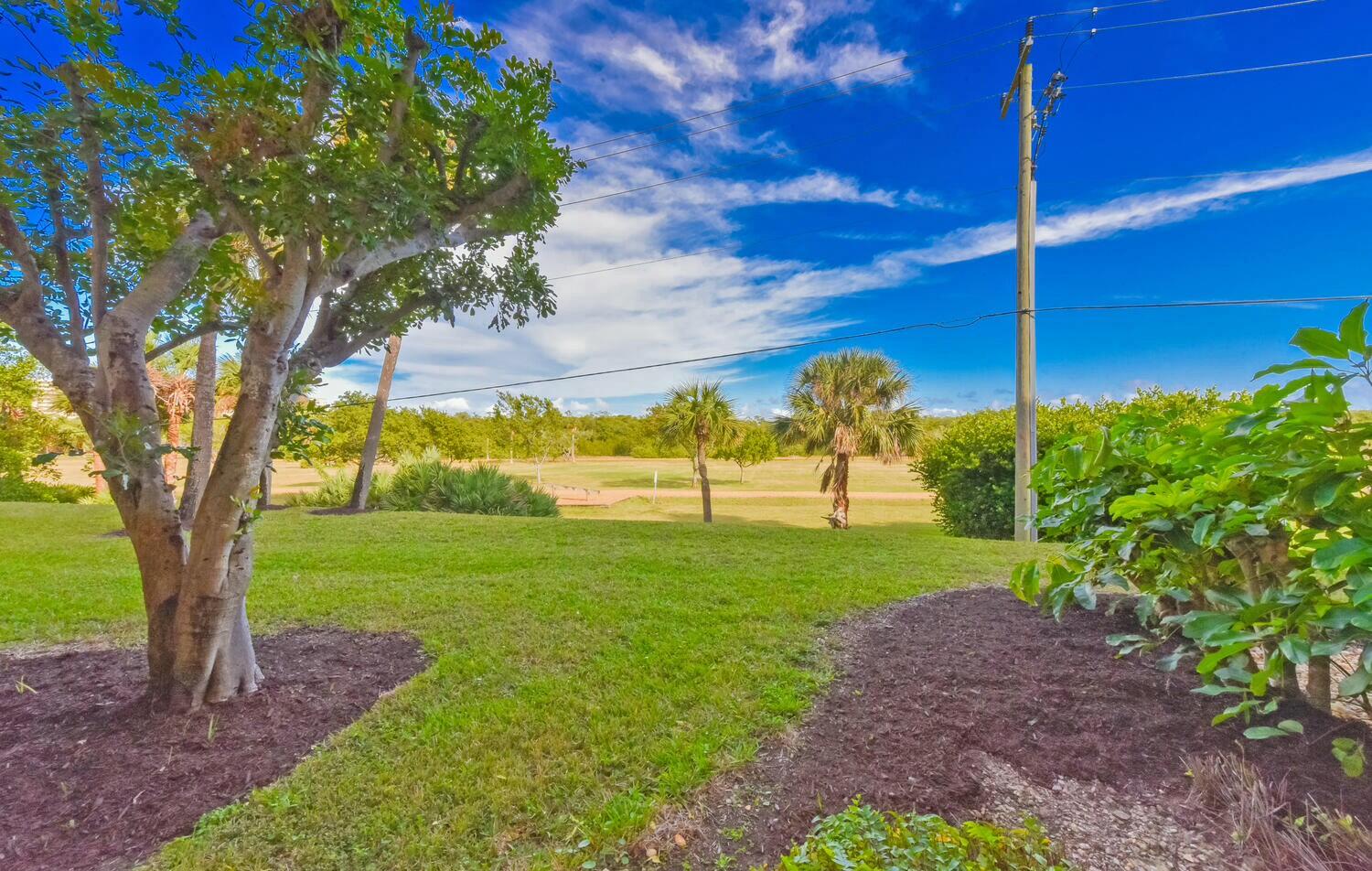275 Palm Avenue, Unit B106 Jupiter, FL 33477 - Photo 25 of 43 a view of a park