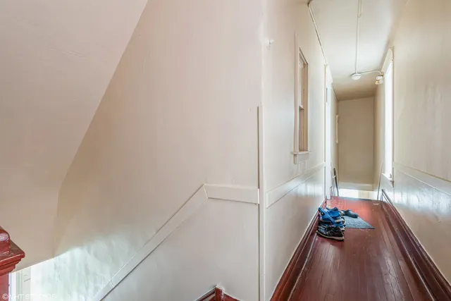 a view of a hallway view with staircase