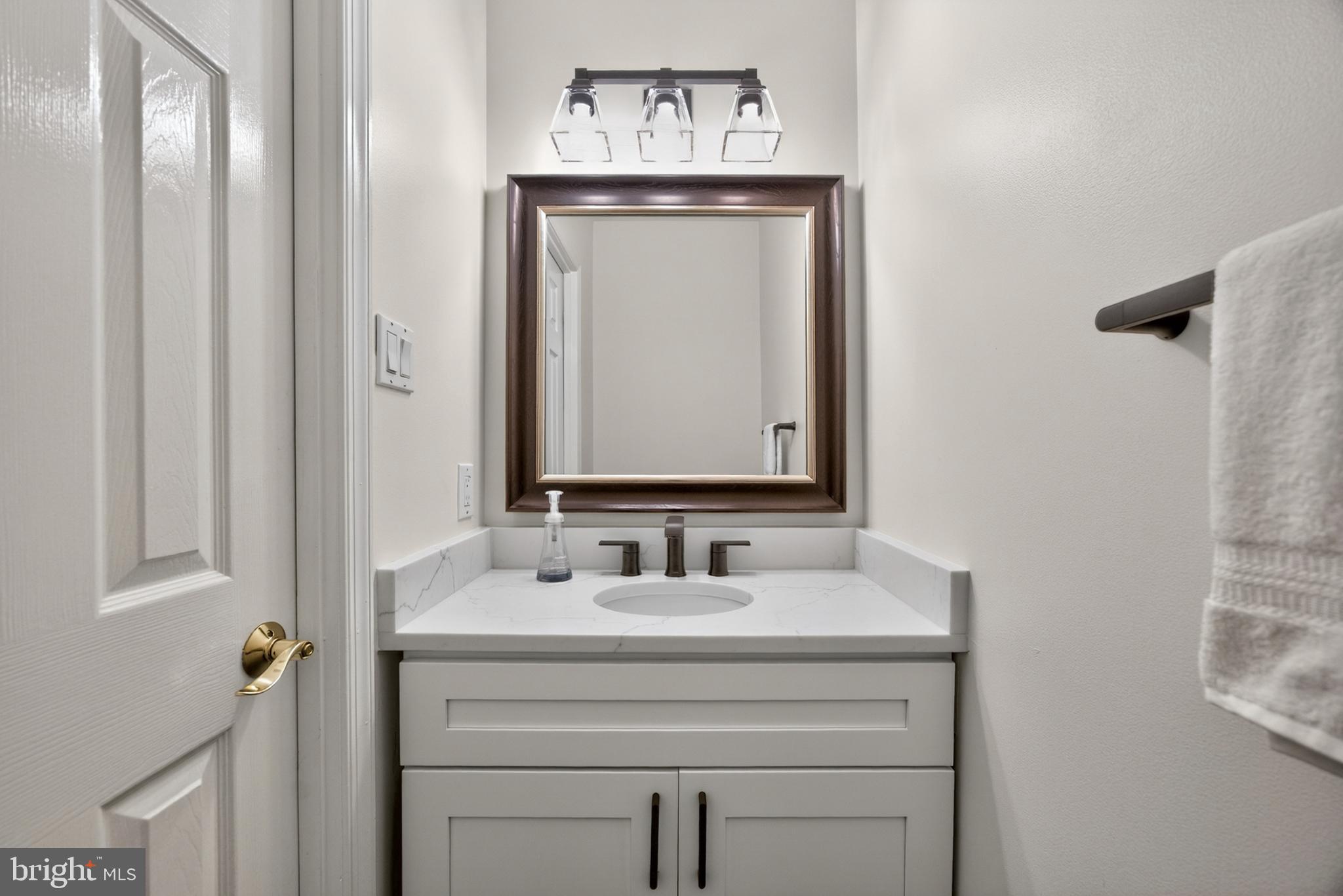 4028 Forest Valley Road Baltimore, MD 21234 - Photo 15 of 53 Powder Room Fully Renovated in 2024