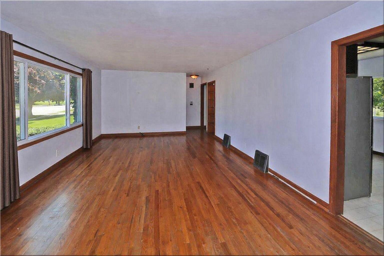 2618 James Boulevard Racine, WI 53403 - Photo 13 of 38 Spacious living room with natural light