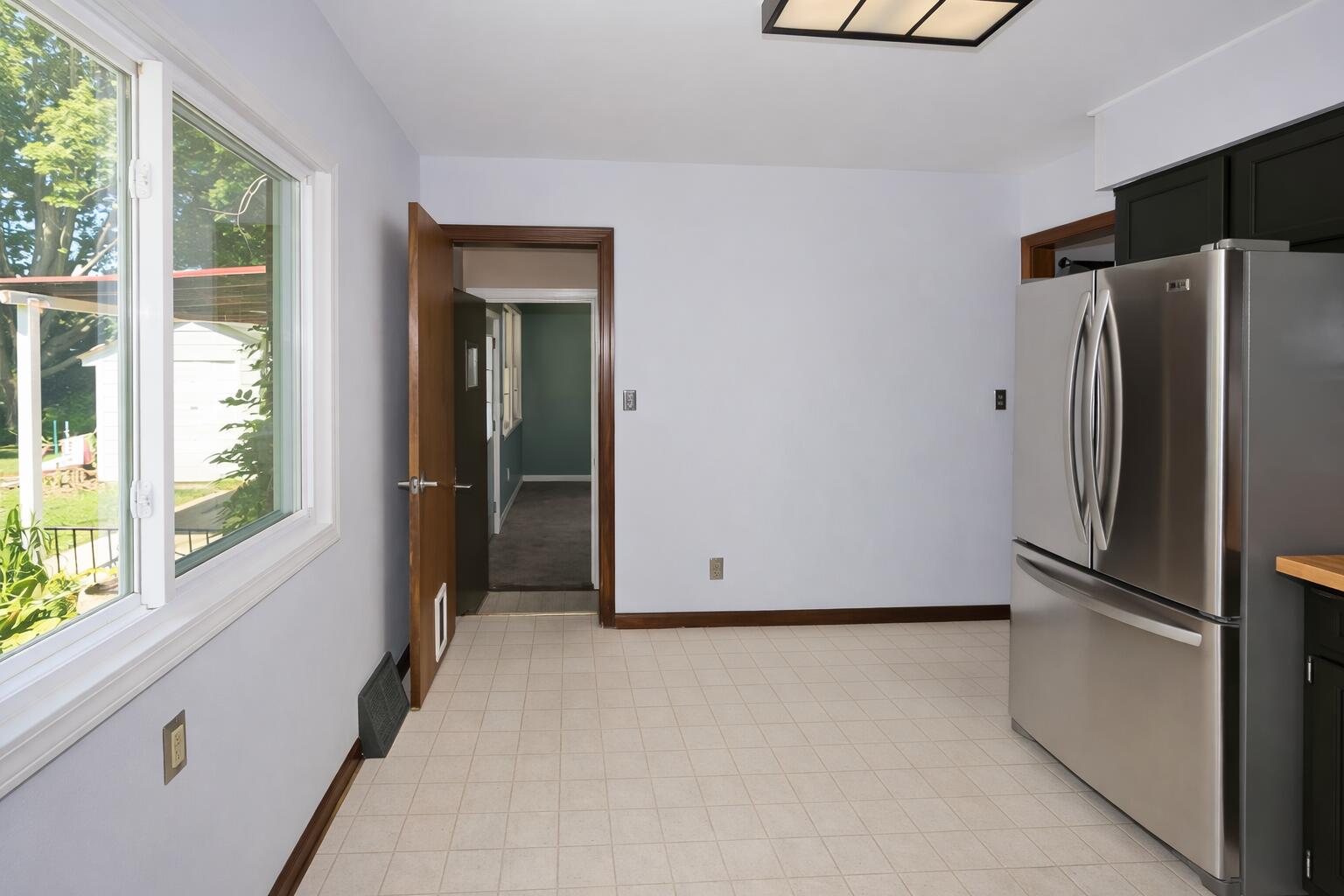 2618 James Boulevard Racine, WI 53403 - Photo 30 of 38 Bright kitchen with green outdoor view