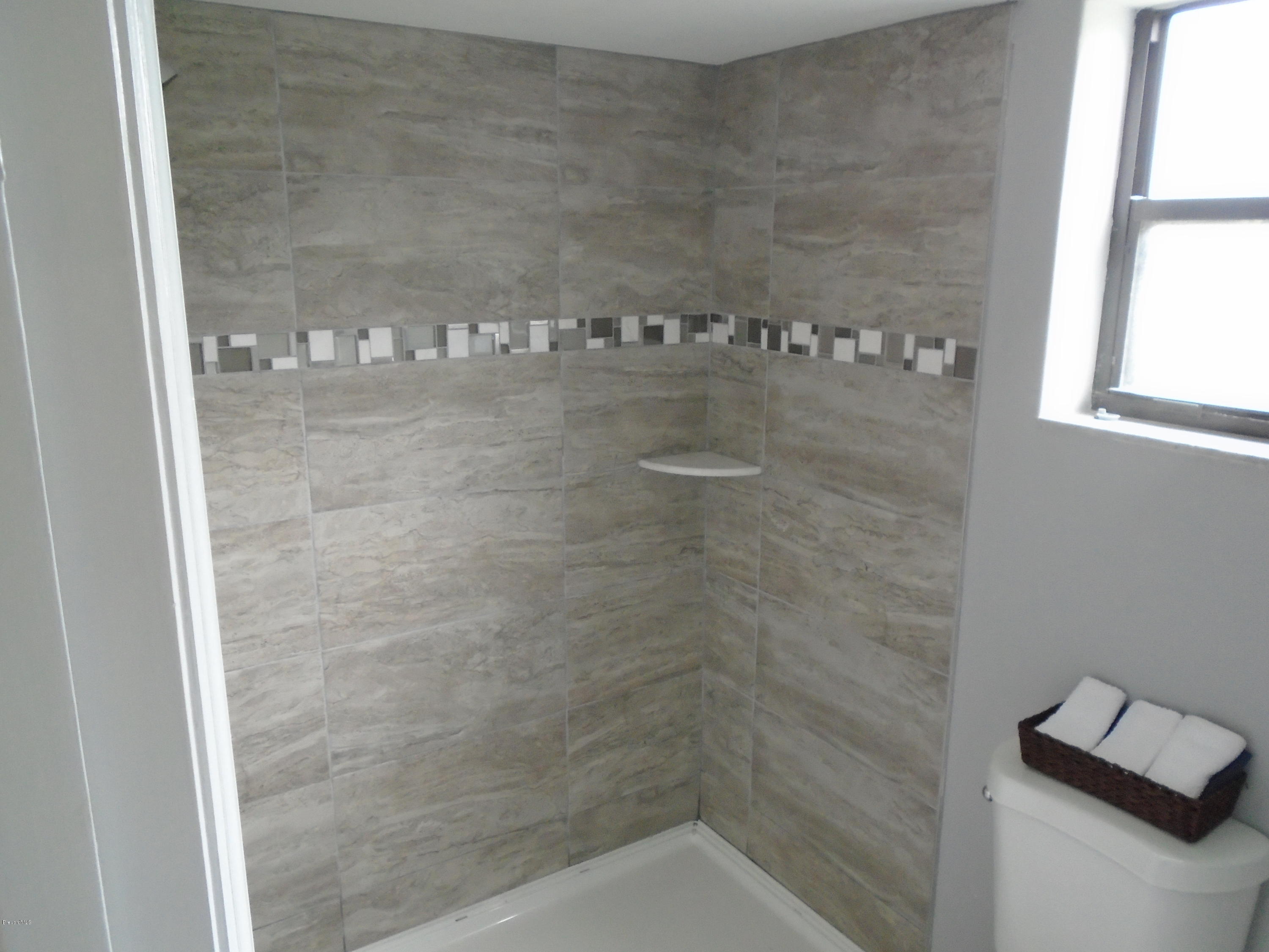 2597 Simon Road Melbourne, FL 32904 - Photo 5 of 12 master bath