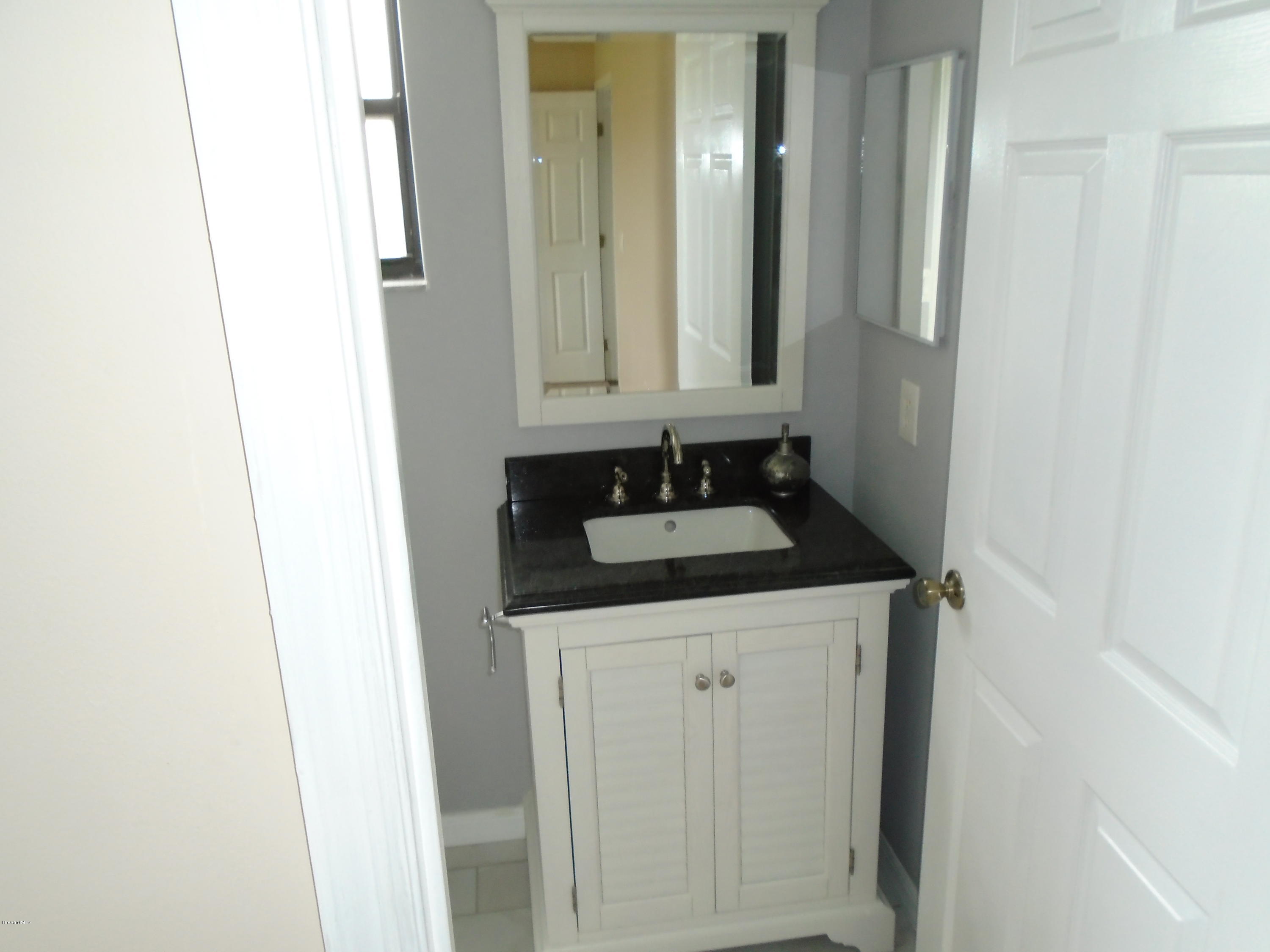 2597 Simon Road Melbourne, FL 32904 - Photo 6 of 12 master bath