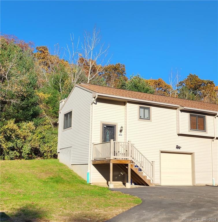 a house view with a backyard space