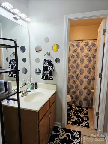 a bathroom with a sink and a shower